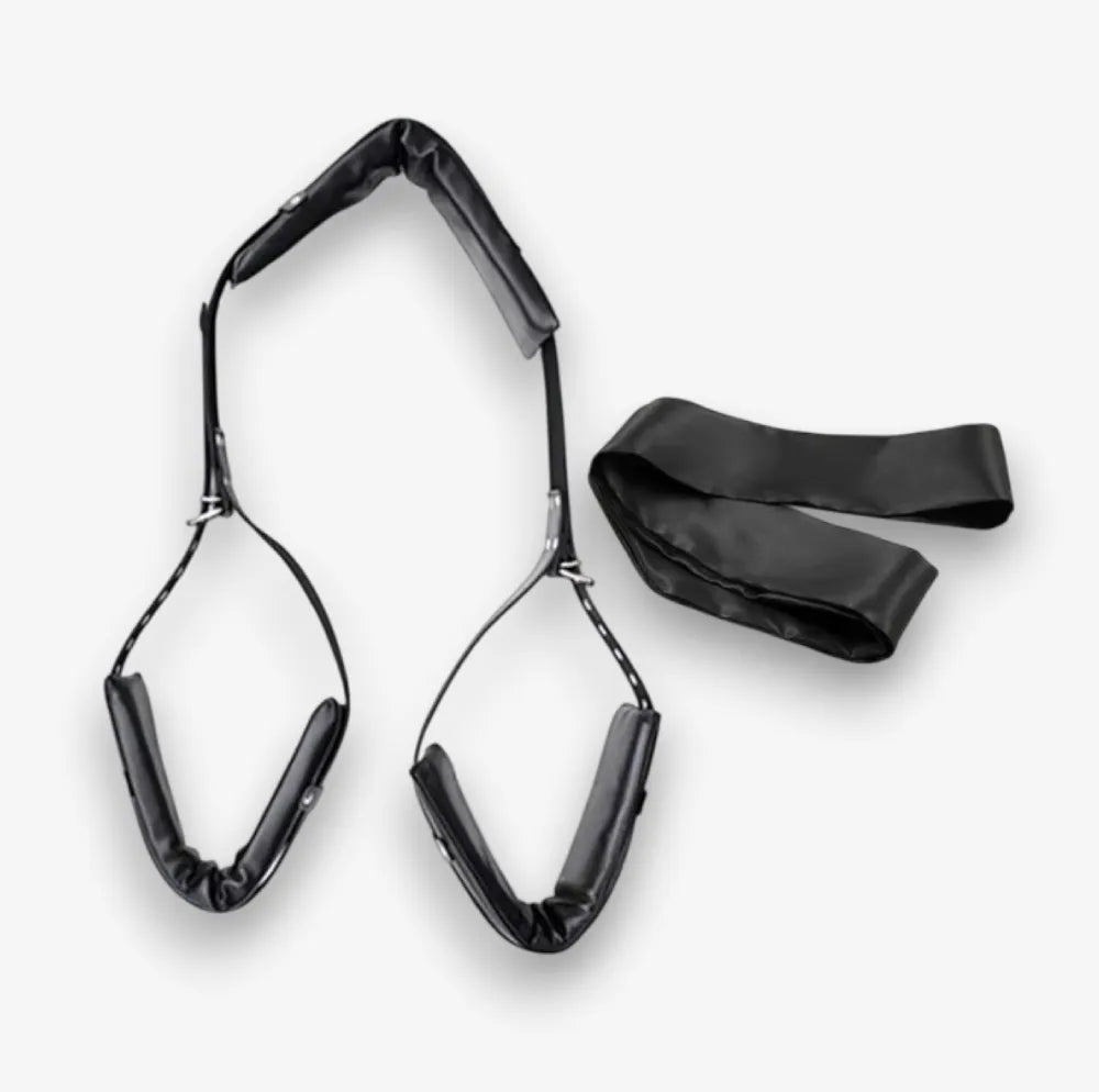 Adjustable leather bondage accessory harness with open legs spreader for fetish couples